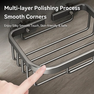 Grey wall-mounted aluminum bathroom rack with hollow drain design and polished finish
