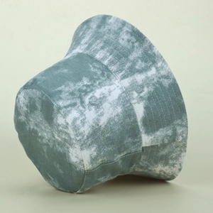 Close-up of marble tie-dye bucket hat with detailed stitching on the cotton brim