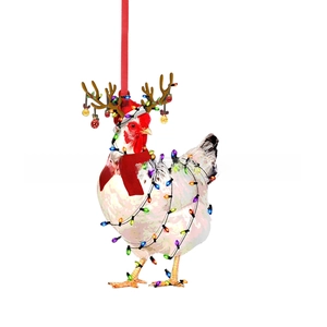Detail of Christmas rooster hanging ornament with Santa hat and scarf for tree decor