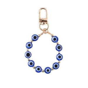 Vintage evil eye beaded keychain with blue resin beads and golden metallic clasp accessory