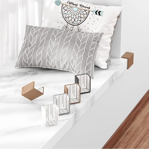 L-shaped silicone table corner protectors in brown, black, grey and clear finishes