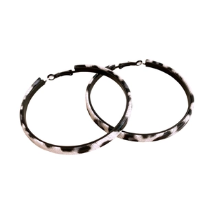 Stylish large round hoop earrings with black and white leopard animal pattern texture
