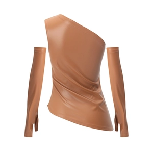 Detailed shot of tan PU leather asymmetric single shoulder top with matching sleeve covers