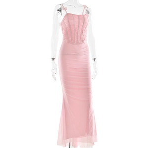 Detail of pink backless dress showing pleats and 3D butterfly embellishments