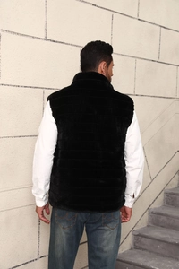 Rear view of black faux fur vest for men showing horizontal quilting and soft texture