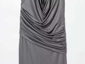 Detailed view of the dark grey cowl neck design with elegant side ruching and pleated fabric