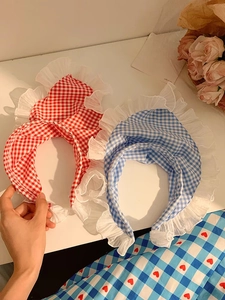 Detailed close-up of blue and red plaid lace headband hair accessories in French rural style