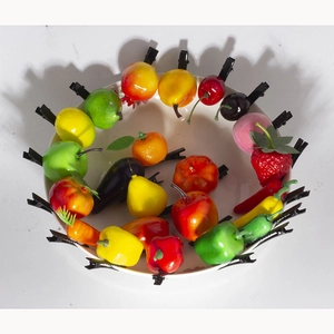 Assorted 3D resin fruit and vegetable hair clips in a white plate for girls and kids