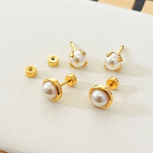 Elegant pearl screw back earrings set in minimalist gold plated stainless steel designs