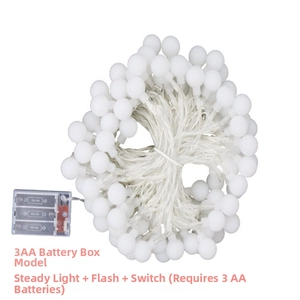 Close-up of LED ball lights with a 3AA battery box showing flash and steady modes