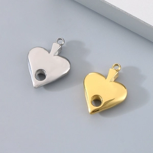 Polished hollow heart shaped metal charms in gold and silver finishes for jewelry DIY