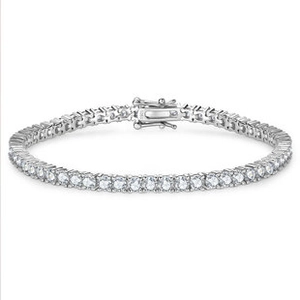 Macro shot of S925 sterling silver tennis bracelet with four-prong moissanite setting