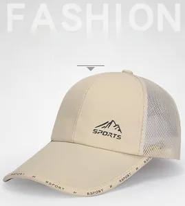Detail of beige mesh baseball cap featuring mountain graphics and SPORTS embroidery