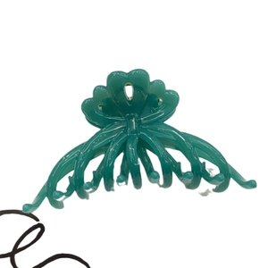 Large green floral hair claw clip with elegant 8-prong bow design for women
