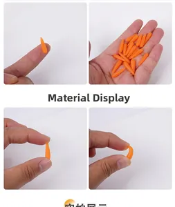 Detailed view of flexible orange mini carrot miniatures being squeezed to show high elasticity