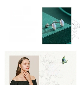 Macro detail and model view of marquise opal stud earrings in S925 sterling silver