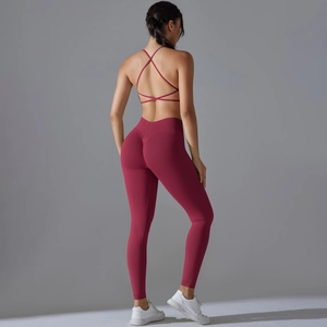 Detail view of seamless backless yoga set in burgundy with scrunch butt lifting leggings