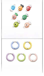 Detail of colorful handmade enamel fish charms and matching macaron hoop earrings