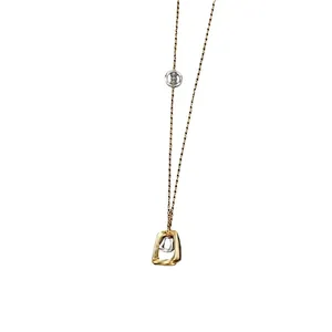 Golden minimalist geometric pendant necklace with O-chain design for men and women