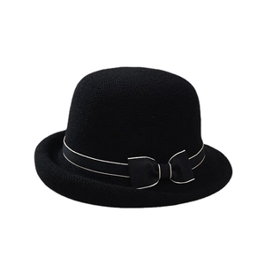 Women's black knitted sun hat with elegant bow and stylish rolled brim for summer