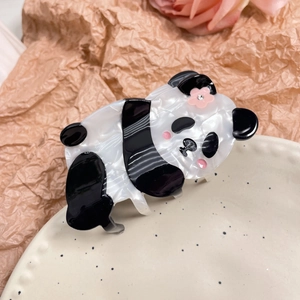 Cute panda hair claw clip in black and white acetate with pink flower accent