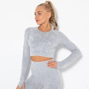 Detailed texture of seamless marble wash long sleeve fitness top and high waist yoga pants