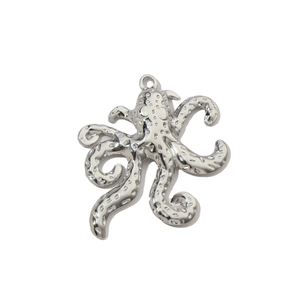Detailed close-up of a silver octopus pendant with intricate tentacle textures and shine