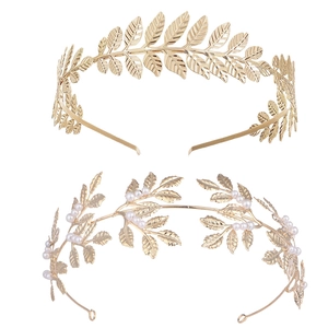 Detailed view of gold leaf bridal headband set with metallic leaves and pearl accents