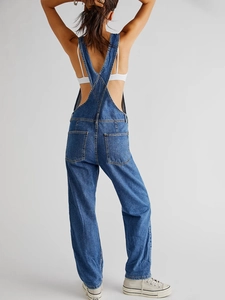 Classic blue denim overalls for women featuring cross-back straps and a large back pocket