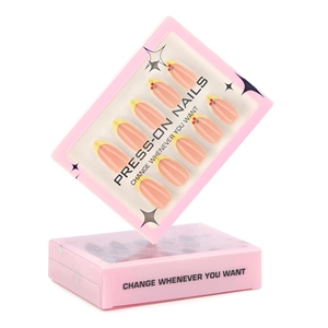 3D cherry press-on nails with yellow French tips and almond shape on white background