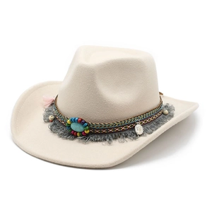 Detail of cream felt cowboy hat with bohemian beaded band and grey tassel trim
