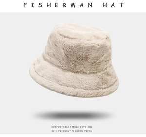 Detail view of the soft plush fabric texture on this beige fisherman bucket hat