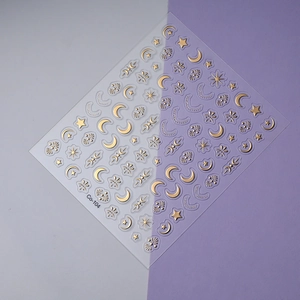 Golden star and moon nail art stickers with metallic foil finish on transparent backing