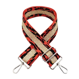 Detail of 5cm wide leopard print bag strap with silver metal hooks and buckle