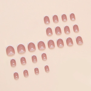 French tip press-on nails in nude pink gradient with glitter finish and 24 pieces