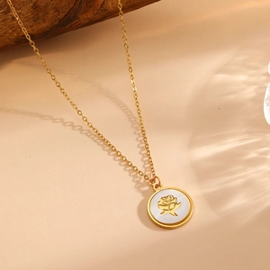 18K gold plated necklace with a round shell pendant featuring a rose flower relief design