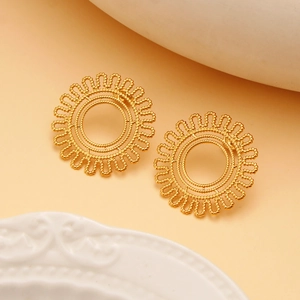Detailed view of 18K gold plated sunflower earrings with beaded sunburst texture