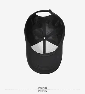 Internal view of black mesh baseball cap showing breathable lining and adjustable strap