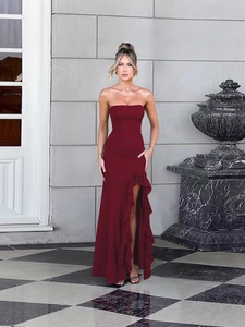 Elegant strapless burgundy evening dress with high slit and ruffle trim for women