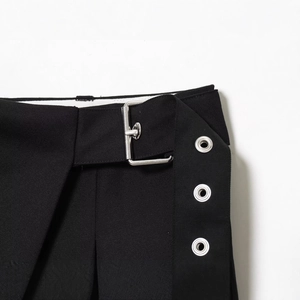 Women's black blend trousers featuring wrap design and metallic eyelet belt details