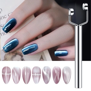 Double-headed magnetic tool for cat eye nail art with rotating rollers for texture effects