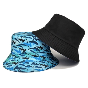 Minimalist black and blue sea creature print bucket hats for sun protection and style