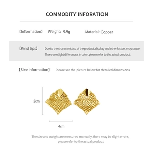 Macro detail of 18k gold plated geometric earrings with dimensions and copper specs
