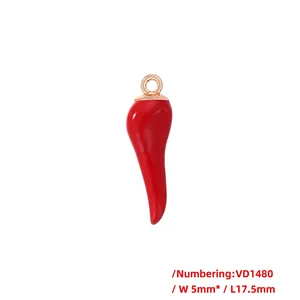 Detailed macro view of a red enamel chili pendant measuring 5mm by 17.5mm
