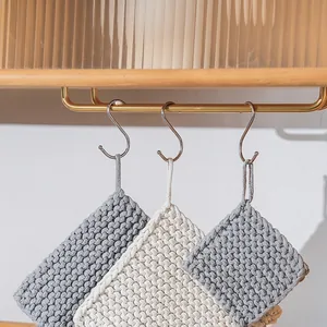 Nordic woven cotton heat-resistant pot pads in grey and cream with hanging loops