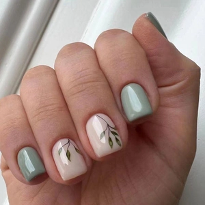 Short square press-on nails with sage green finish and hand-painted leaf floral designs