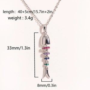Macro shot showing physical dimensions and weight of the articulated fish bone pendant