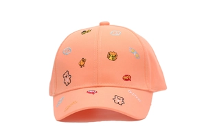 Close-up of peach kids baseball cap with detailed animal embroidery and DINO text