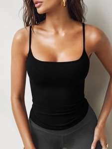 Detail of black slim-fit tank top showing U-neckline and elastic milk silk fabric