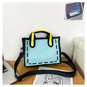 Close-up of 2D comic style light blue canvas tote bag with bold black outlines on a desk